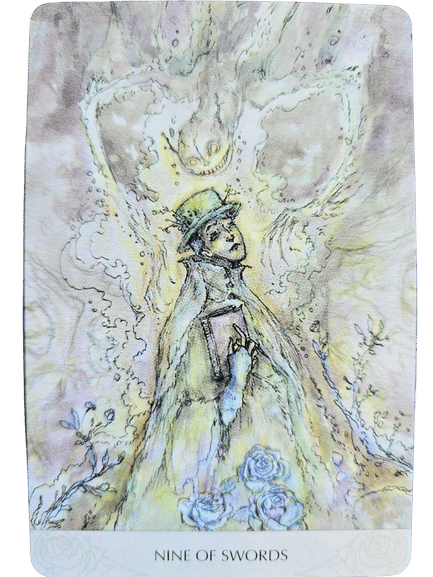A Magicmakers Tarot card, the Nine of Swords, shows a distressed figure holding a book, surrounded by swirling, ghostly shapes and blue roses, with ethereal, dream-like imagery and a luminous, watchful face above.