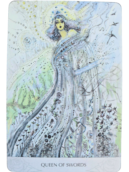 A tarot card from the Magicmakers Tarot titled Queen of Swords shows a regal woman with dark hair, wearing a crown and flowing robes, surrounded by swirling, airy patterns and birds in a dreamy, ethereal landscape.
